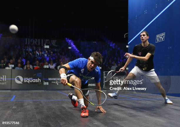 Miguel Angel Rodriguez of Colombia plays a backhand shot against Ali Farag of Egypt during their Quarter Final match in the AJ Bell PSA World Squash...
