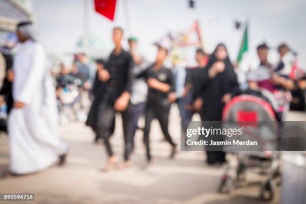 crowded pilgrims walking together - iraq people stock pictures, royalty-free photos & images