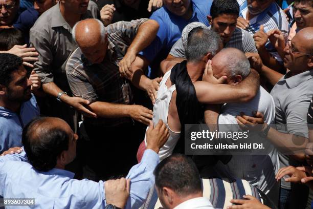 In the Gaza war, many civilians get killed. During an Israeli bombing, tens of people get killed. Two nephews, Abu Shufka and Abdel Jalil are killed...