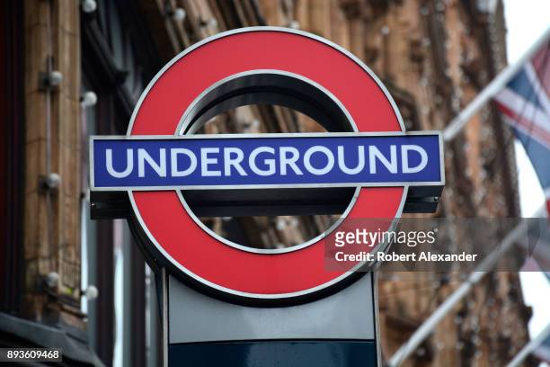 Sign identifies the entrance to the Knightsbridge underground station near Harrods department store in London, England.
