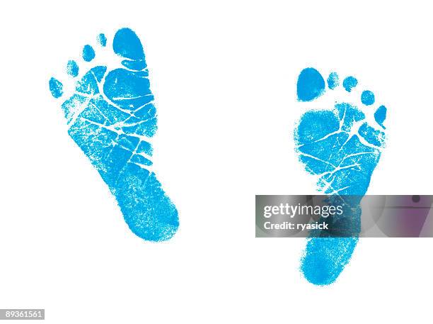 stamp of boy newborn footprints impression in blue ink - fotspår bildbanksfoton och bilder