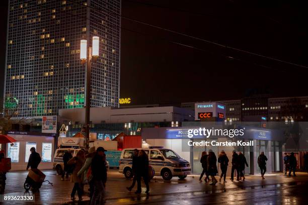 Passers-by pass a new police station at Alexanderplatz on December 15, 2017 in Berlin, Germany. Alexanderplatz, at the heart of Berlin, has seen a...