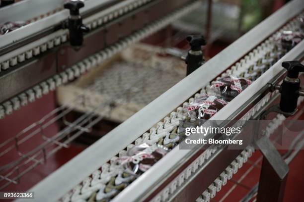 Hostess Brands Inc. Cupcakes move along a conveyor belt at the company's production facility in Emporia, Kansas, U.S., on Thursday, Nov. 16, 2017....