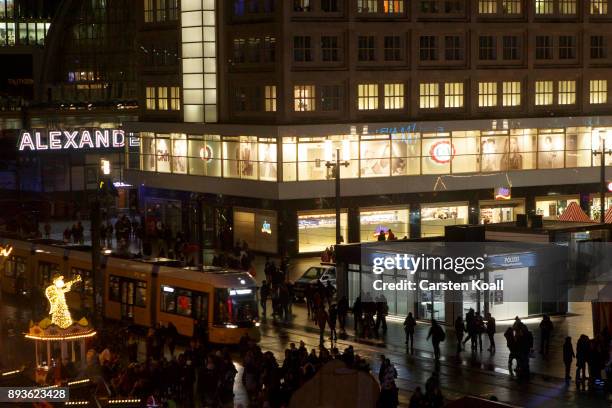 Passers-by pass a new police station at Alexanderplatz on December 15, 2017 in Berlin, Germany. Alexanderplatz, at the heart of Berlin, has seen a...