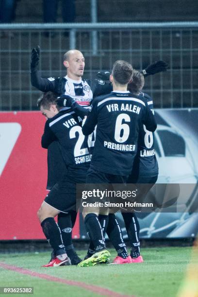 Matthias Morys of Aalen celebrates his side's first goal with his team mates during the 3. Liga match between VfR Aalen and SC Fortuna Koeln at...