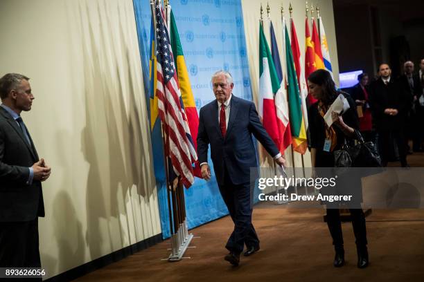 Secretary of State Rex Tillerson exits after speaking to reporters following a United Nations Security Council meeting concerning North Korea's...