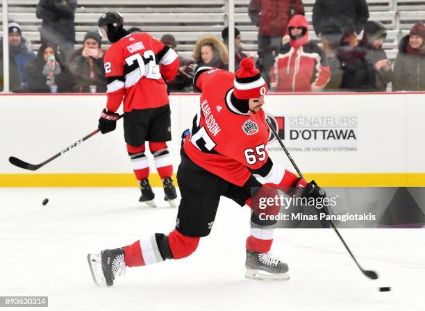 Erik Karlsson of the Ottawa Senators fires a shot during the 2017 Scotiabank NHL100 Classic Ottawa Senators practice on Parliament Hill on December...