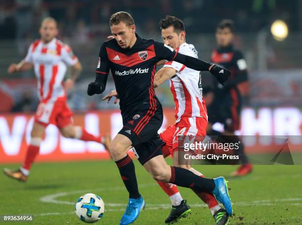 Marcel Gaus of FC Ingolstadt 04 and Steven Skrzybski of 1 FC Union Berlin during the game between Union Berlin and dem FC Ingolstadt 04 on december...
