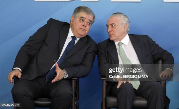Brazilian President Michel Temer , chats with the new Brazilian Minister of Government Secretariat Carlos Marun during his inauguration ceremony, at...