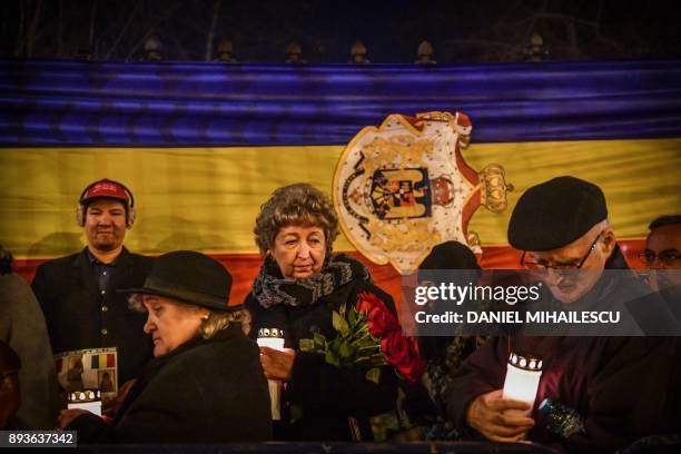 People queue to pay their respects to the late King Michael I of Romania in front of the former Royal Palace that houses the National Arts Museum,...