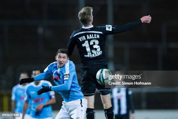 Gerrit Wegkamp of Aalen jumps for a header with Markus Pazurek of Fortuna Koeln during the 3. Liga match between VfR Aalen and SC Fortuna Koeln at...