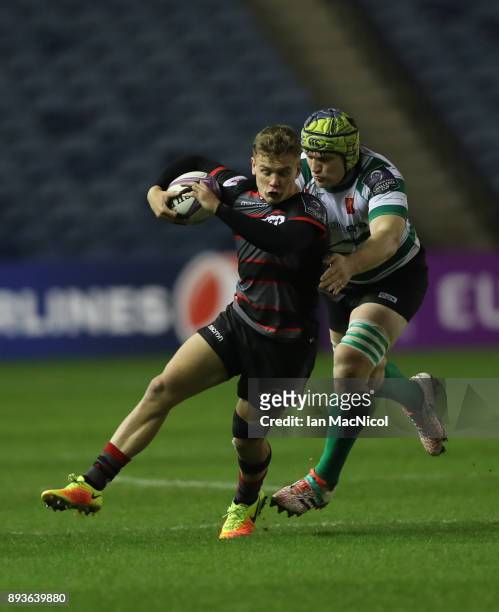 Andrei Garbuzov of Krasny Yar tackles Darcy Graham of Edinburgh during the European Rugby Challenge Cup match between Edinburgh and Krasny Yar at...