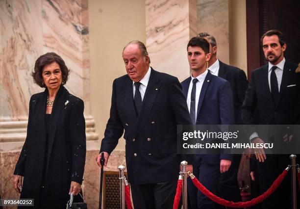 Former Queen of Spain Sophia and former King of Spain Juan Carlos arrive to pay their respects to the late King Michael I of Romania inside the...