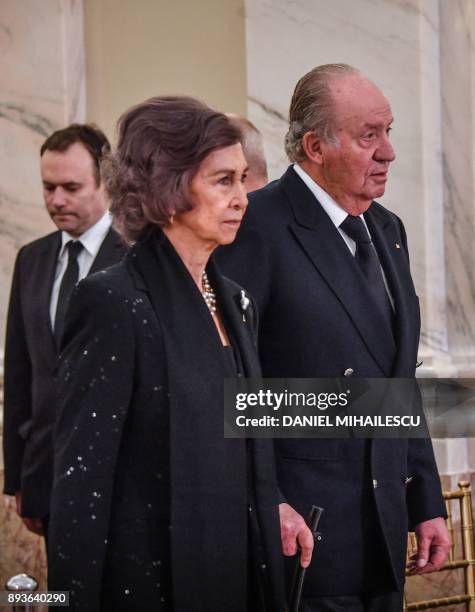Former Queen of Spain Sophia and former King of Spain Juan Carlos arrive to pay their respects to the late King Michael I of Romania inside the...