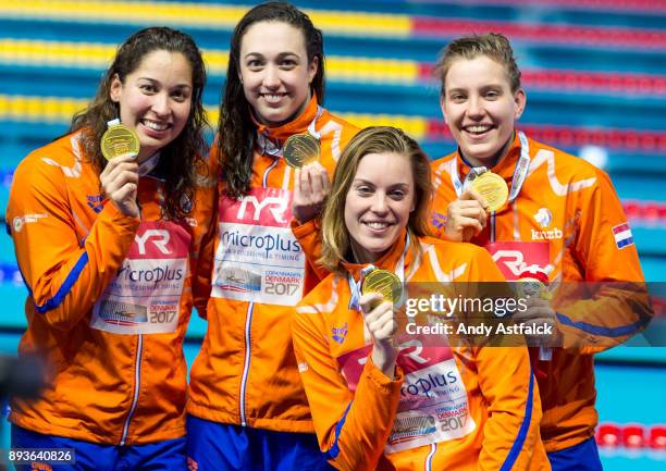 Ranomi Kromowidjojo, Tamara van Vliet, Femke Heemskerk and Valarie van Roon of the Netherlands win Gold and set a new World Record during the Women's...