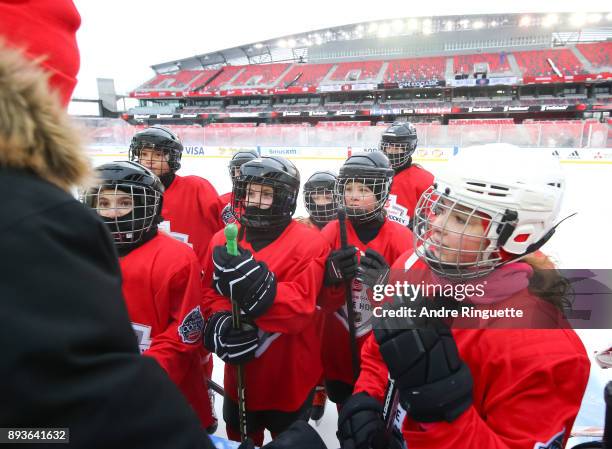 Scotiabank skaters huddle up to celebrate the sponsorship of 1 million minor hockey league kids in advance of the 2017 Scotiabank NHL100 Classic at...