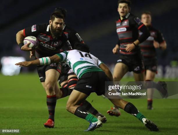 Cornel Du Preez of Edinburgh is tackled by Sunia Latu of Krasny Yar during the European Rugby Challenge Cup match between Edinburgh and Krasny Yar at...