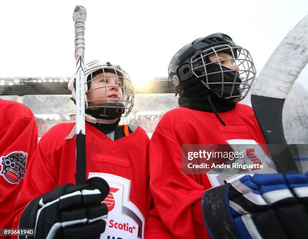 Scotiabank skaters watch from the bench to celebrate the sponsorship of 1 million minor hockey league kids in advance of the 2017 Scotiabank NHL100...