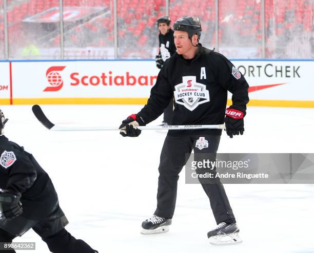 Ottawa Senators alumni Chris Neil skates with Scotiabank skaters to celebrate the sponsorship of 1 million minor hockey league kids in advance of the...