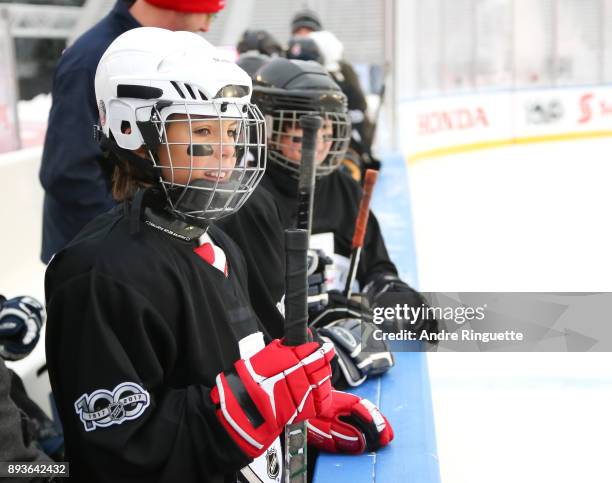 Scotiabank skaters watch from the bench to celebrate the sponsorship of 1 million minor hockey league kids in advance of the 2017 Scotiabank NHL100...