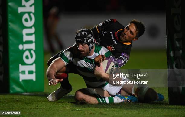 Falcons player Gary Graham scores the third try despite the attentions of Gavin Henson during the European Rugby Challenge Cup match between the...