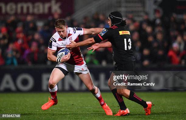 Belfast , United Kingdom - 15 December 2017; Craig Gilroy of Ulster is tackled by Winston Stanley of Harlequins during the European Rugby Champions...
