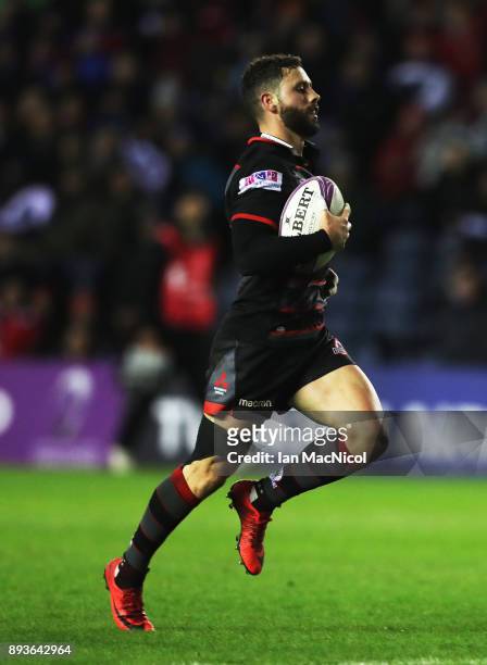 Sean Kennedy of Edinburgh ibreaks away to score his sides sixth try during the European Rugby Challenge Cup match between Edinburgh and Krasny Yar at...