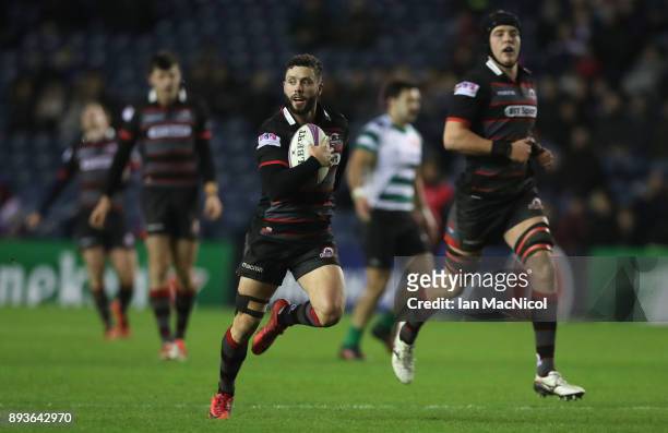 Sean Kennedy of Edinburgh ibreaks away to score his sides sixth try during the European Rugby Challenge Cup match between Edinburgh and Krasny Yar at...
