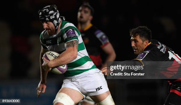 Falcons player Gary Graham breaks through to score the third try despite the attentions of Gavin Henson during the European Rugby Challenge Cup match...