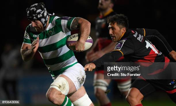 Falcons player Gary Graham breaks through to score the third try despite the attentions of Gavin Henson during the European Rugby Challenge Cup match...