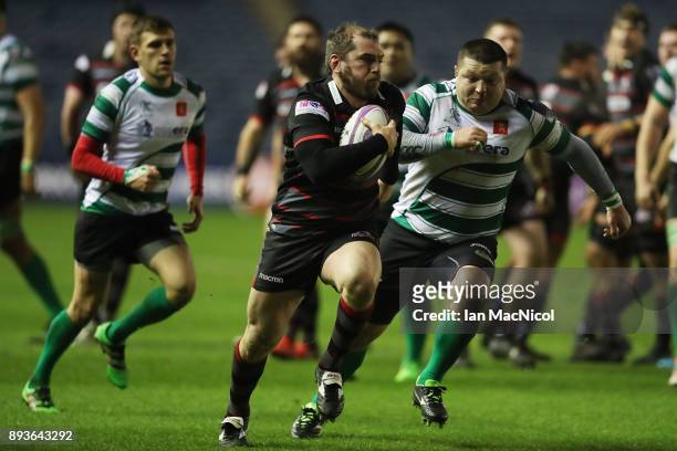 Neil Cochrane of Edinburgh breaks away to score his sides seventh try during the European Rugby Challenge Cup match between Edinburgh and Krasny Yar...