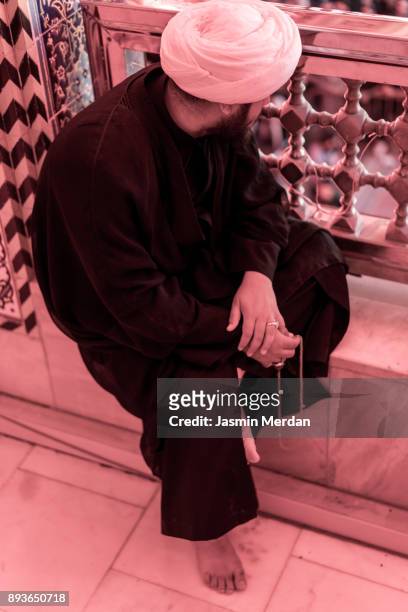 muslim religious man - shrine of the imam ali ibn abi talib stock pictures, royalty-free photos & images