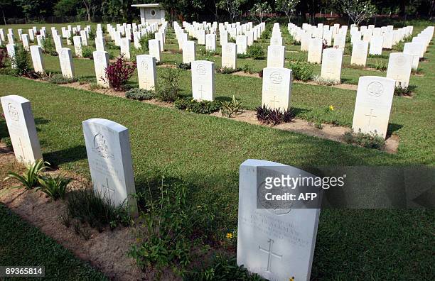 Asia-WWII-history-cemeteries BY ROMEN BOSE A picture dated June 11, 2009 shows rows of tombstones belonging to WWII victims at Kamunting road...
