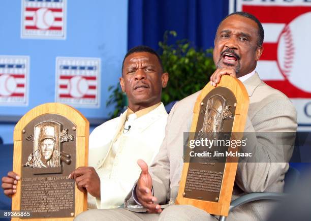 Inductees Rickey Henderson and Jim Rice pose hold their plaques at Clark Sports Center during the Baseball Hall of Fame induction ceremony on July...