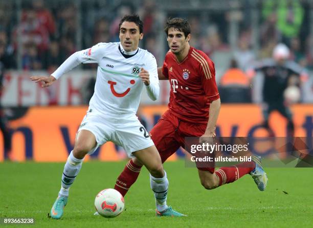 Spieltag, Saison 2012/2013 BUNDESLIGA SAISON 2012/2013 13. Spieltag FC Bayern Muenchen - Hannover 96 Mohamed Abdellaoue gegen Javi , Javier Martinez