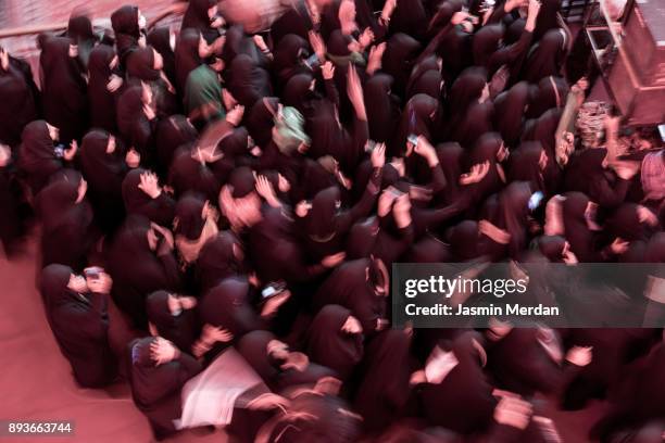 spiritual moving during annual festival in karbala, iraq - bokeh museum stock pictures, royalty-free photos & images