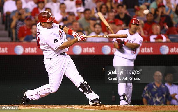 Juan Rivera of the Los Angeles Angels of Anaheim gets a base hit that scored Bobby Abreu in the third inning against the Cleveland Indians at Angel...