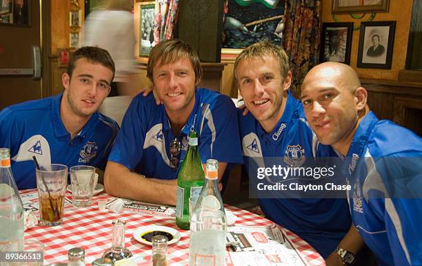 Jose Baxter, Carlo Nash, Philip Neville and Tim Howard pose for a picture as Buca di Beppo hosts pre-game meal for Everton Football Club in Salt Lake...