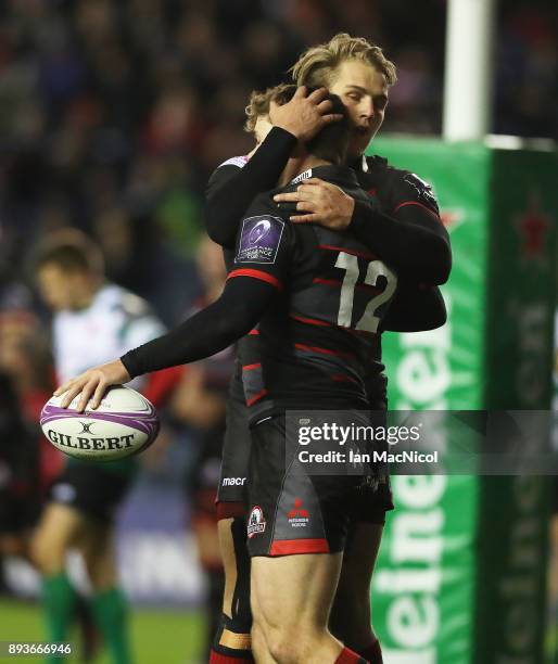 Chris Dean of Edinburgh is congratulated by Duhan Van der Marwe of Edinburgh after scorng his team's second try during the European Rugby Challenge...