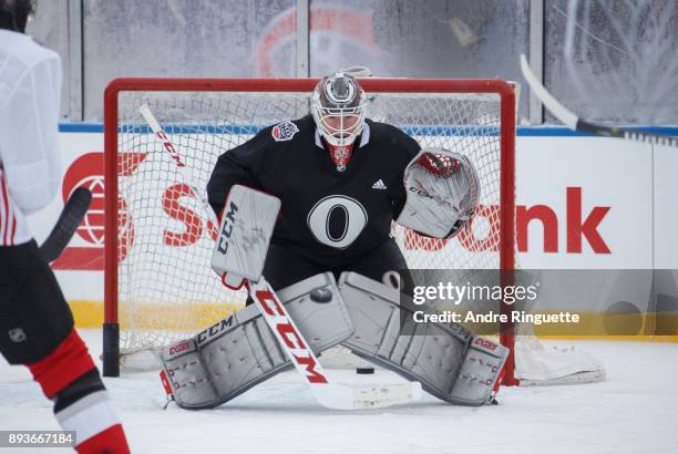 Mike Condon of the Ottawa Senators faces shots from teammates during a practice session ahead of the Scotiabank NHL100 Classic, at Lansdowne Park on...