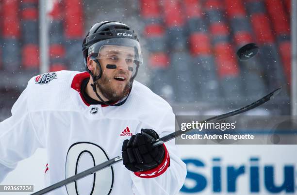 Fredrik Claesson of the Ottawa Senators shows off some fancy stick work during a practice session ahead of the Scotiabank NHL100 Classic, at...