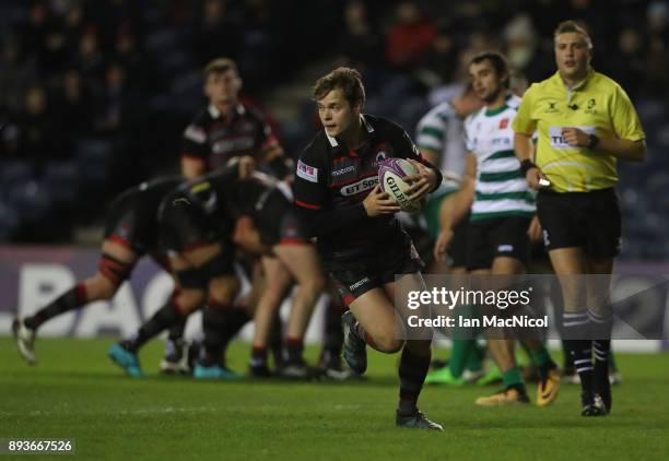Chris Dean of Edinburgh breaks away to score his team's second try during the European Rugby Challenge Cup match between Edinburgh and Krasny Yar at...