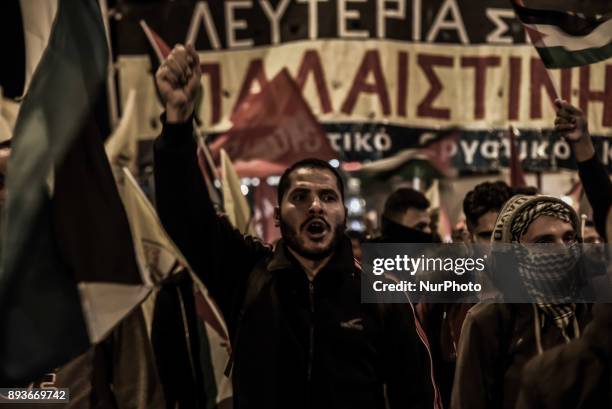 Palestinians take part in a demonstration in Athens, Greece on December 15 near the US embassy in Athens, after US President Donald Trump recognise...