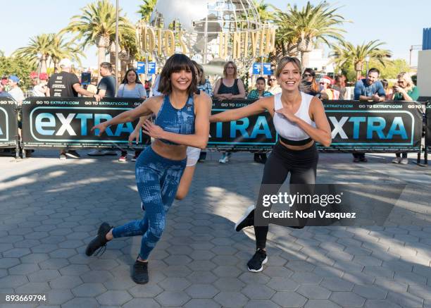 Nina Dobrev and Renee Bargh work out together at "Extra" at Universal Studios Hollywood on December 15, 2017 in Universal City, California.