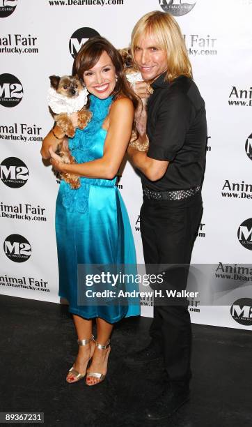 Sara Gore and fashion designer Marc Bouwer attend Animal Fair's 10th Annual "Paws For Style" at M2 Ultra Lounge on July 27, 2009 in New York City.