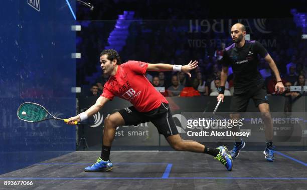 Karim Abdel Gawad of Egypt plays a forehand shot against Marwan ElShorbagy of Egypt in their Quarter Final match during the AJ Bell PSA World Squash...