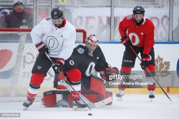 Craig Anderson of the Ottawa Senators guards his net against Nate Thompson and Matt Duchene during a practice session ahead of the Scotiabank NHL100...