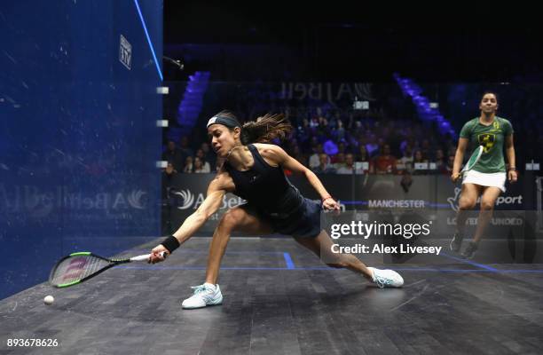 Nicol David of Malaysia plays a forehand shot against Raneem El Welily of Egypt during their Quarter Final match in the AJ Bell PSA World Squash...