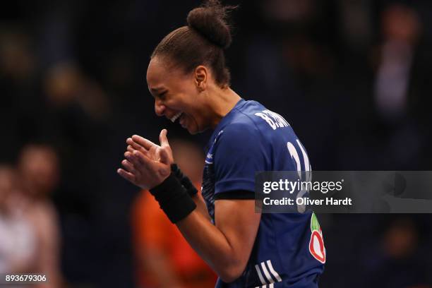 Beatrice Edwige of France celebrate after the IHF Women's Handball World Championship Semi Final match between Sweden and France at Barclaycard Arena...