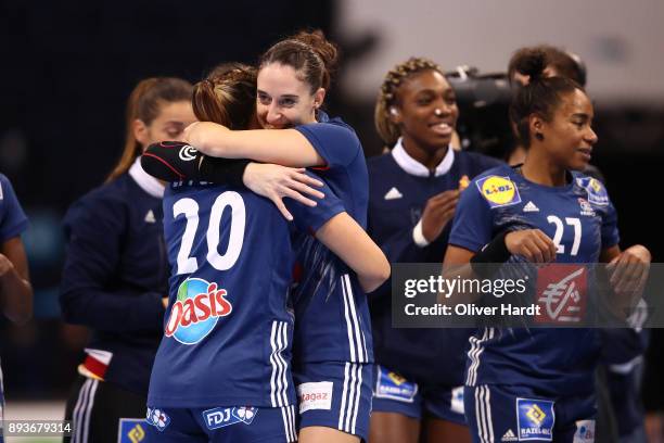 Laura Flippes and Camille Ayglon Saurina of France celebrate after the IHF Women's Handball World Championship Semi Final match between Sweden and...